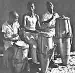 Image - African Atabaq drummers - kinesthetic, auditory and visual knowledge passes naturally from older to younger men