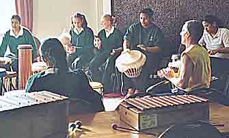 Image - Rhythm in Schools - group of high school students drumming with Fraser Bruce